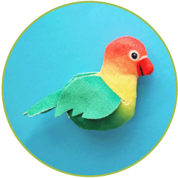 Red, yellow and green tropical bird plushie