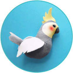 Gray and white tropical bird plushie