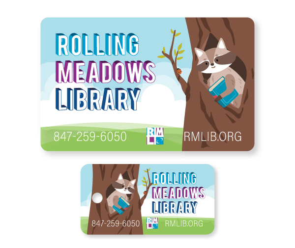 Library card and keychain tag design of cartoon raccoon holding a book while leaning out of a tree and a meadow in the background