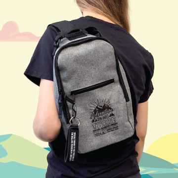 Gray Sling bag with the 'Adventure is Out There' logo and key chain strap