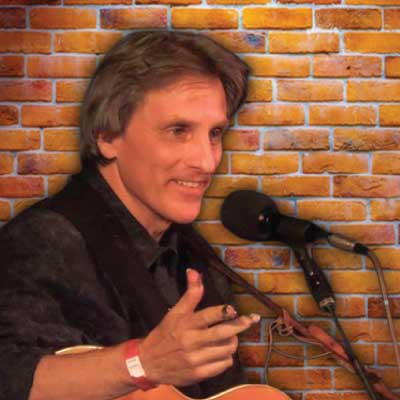 Mark Dvorak with his guitar