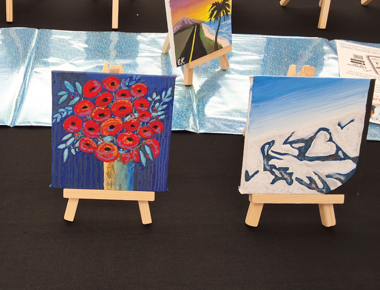 Painting of flower and painting of ocean waves