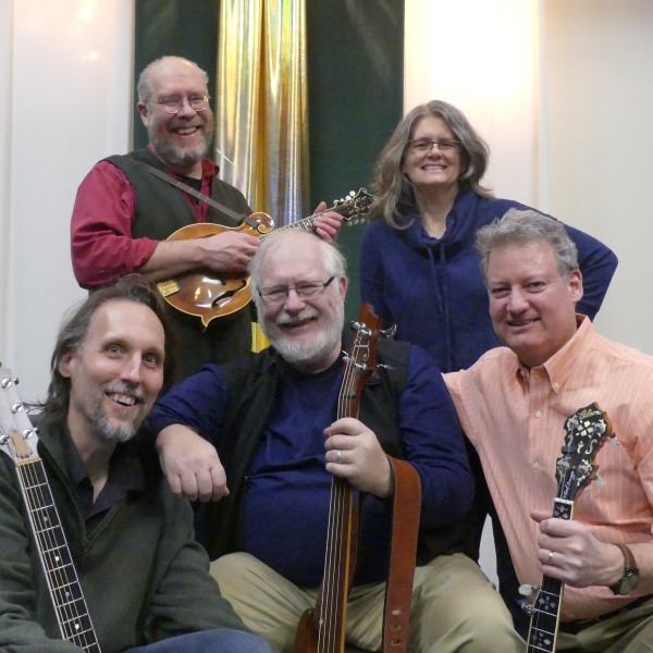 The members of Shamrock Ragsters posing with their instruments